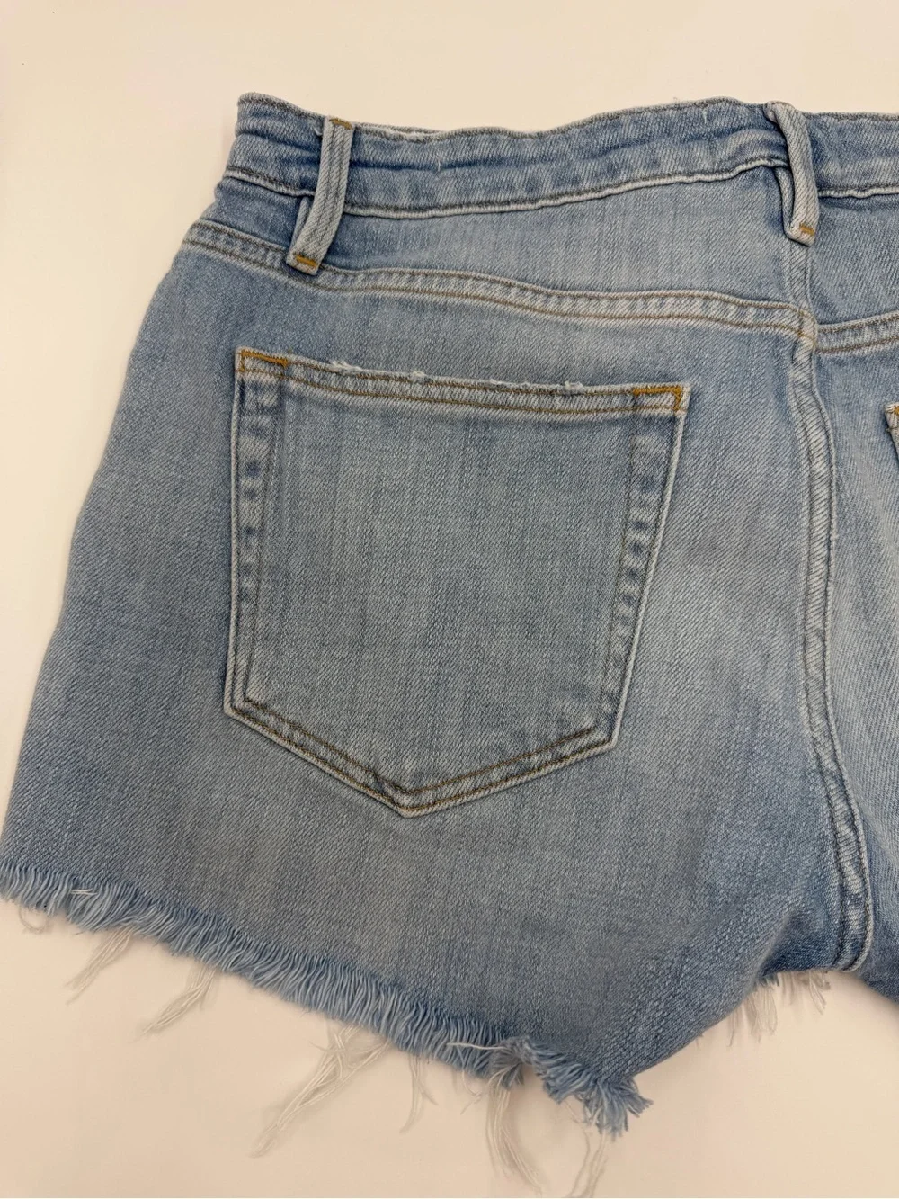 Frame Denim Shredded Raw-Edge Denim Shorts in Hurrah 26